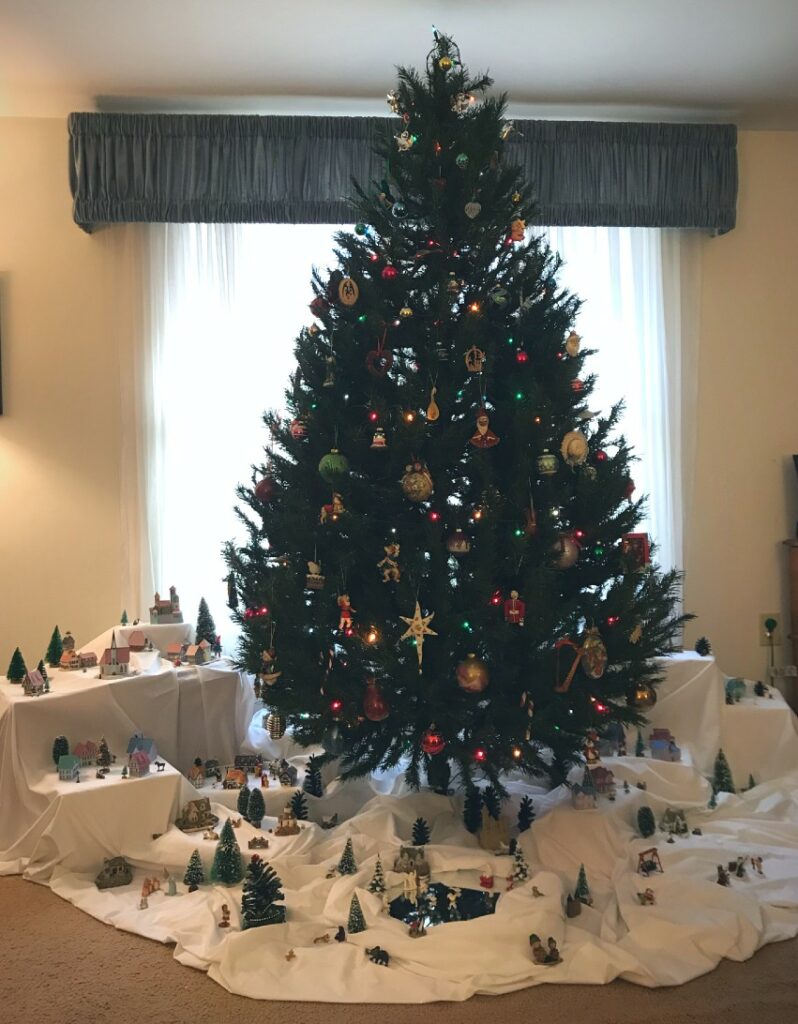 Christmas tree with Christmas villages beneath