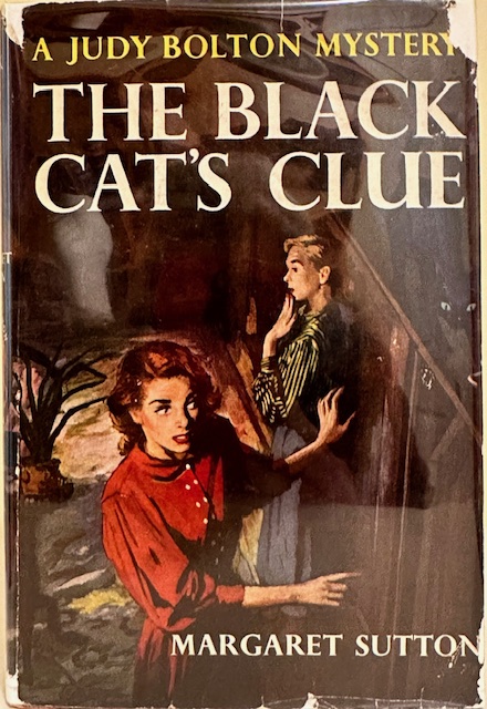 Book Cover: The Black Cat's Clue (Judy Bolton Mysteries #23), by Margaret Sutton (original 1952 edition, in dust jacket)